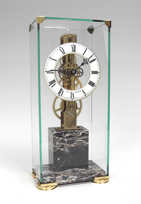 MATHEY SKELETON CLOCK: Metal face with