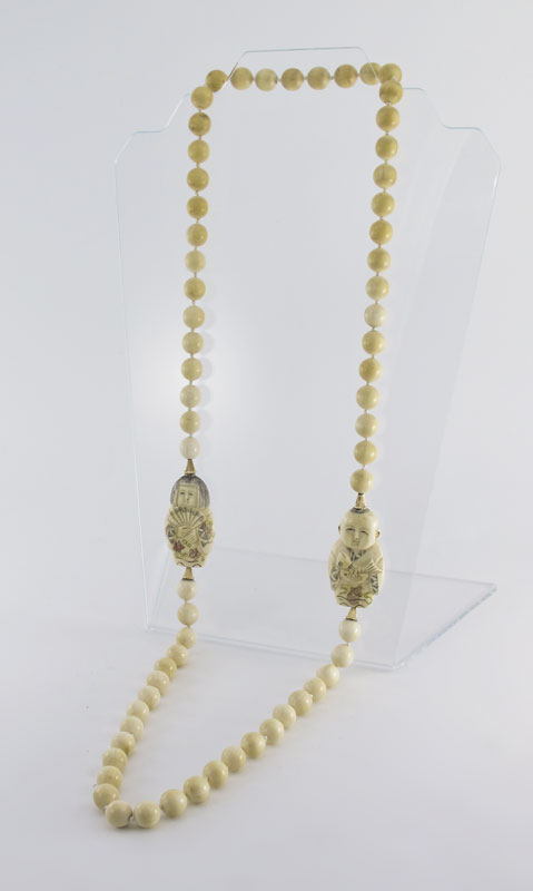 CARVED IVORY NECKLACE: 38'' strand