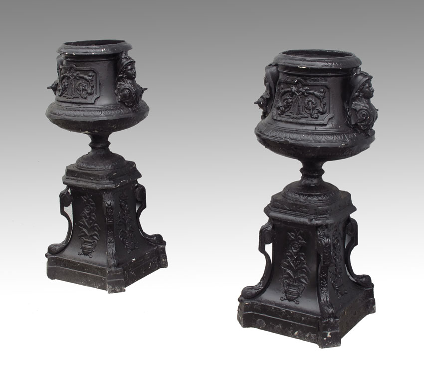 PAIR OF CAST IRON PLANTERS: Decorated