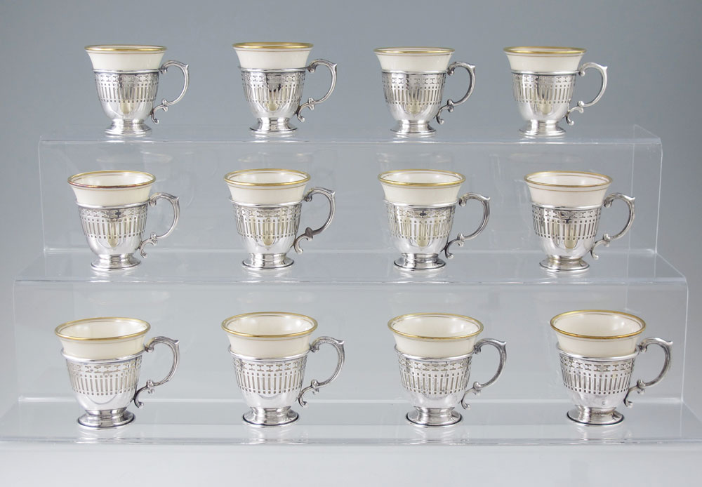 12 STERLING DEMITASSE HOLDERS WITH 1494ff