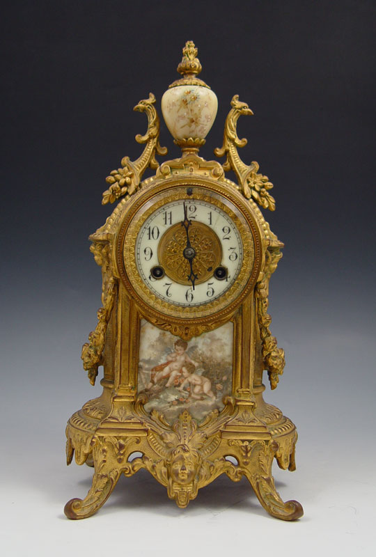 WATERBURY GILT METAL SHELF CLOCK: Cast