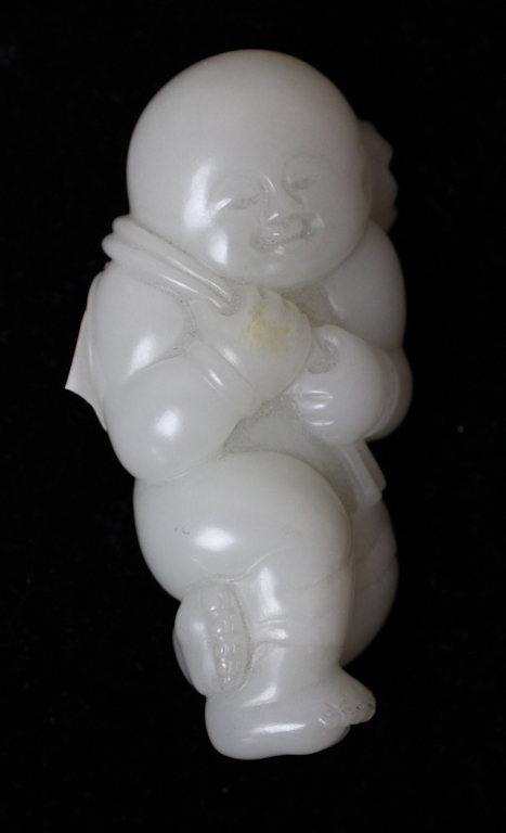 CHINESE WHITE JADE CARVING OF A 147335