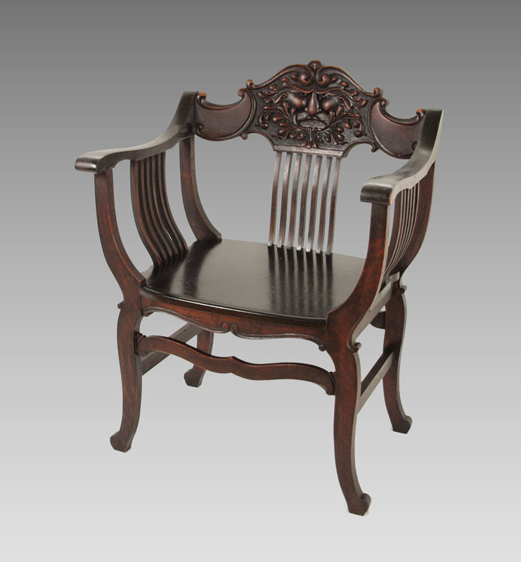 NORTH WIND CARVED CHAIR: 37 1/2 h.