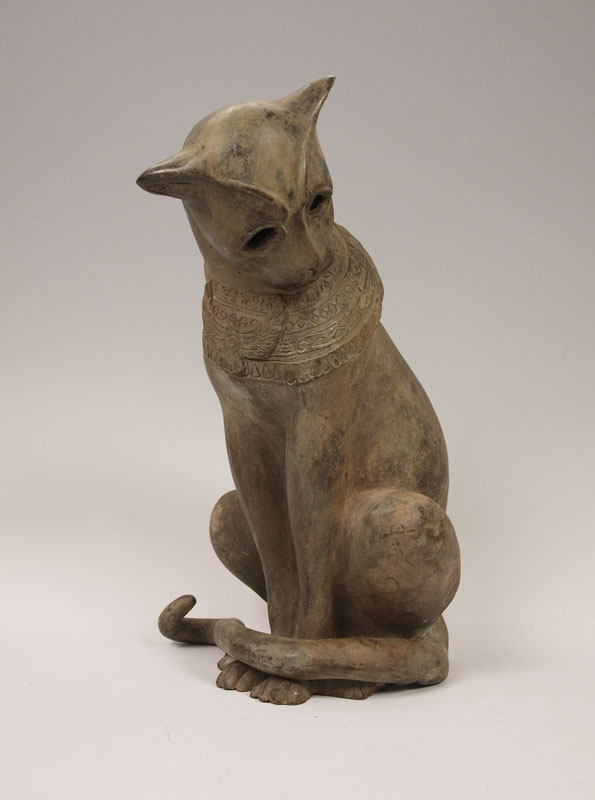 BRONZE MODEL OF AN EGYPTIAN CAT: