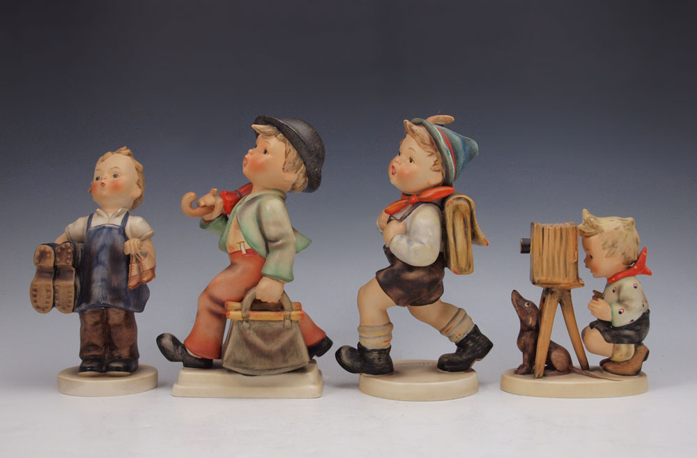 FOUR LARGE HUMMEL FIGURINES: To include