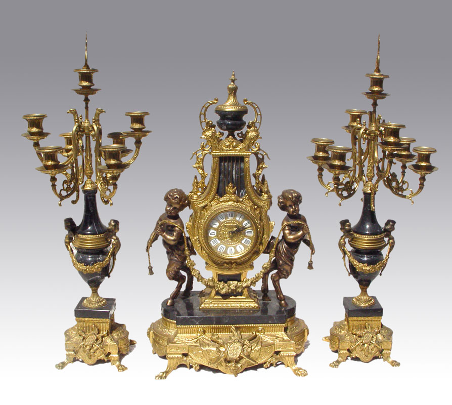 IMPERIAL FIGURAL CLOCK GARNITURE