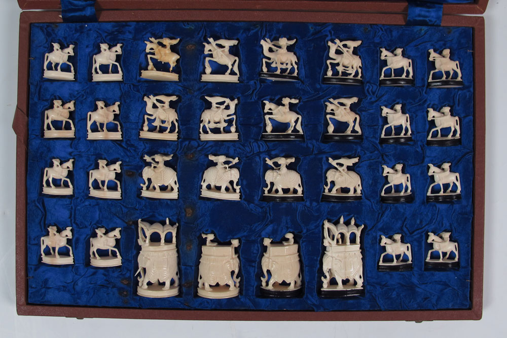 CHINESE CARVED IVORY CHESS SET: