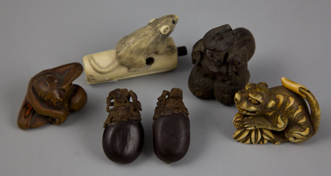 AN ECLECTIC GROUP OF FOUR NETSUKE 147876