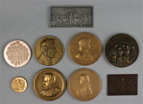 NINE COMMEMORATIVE PIECES including