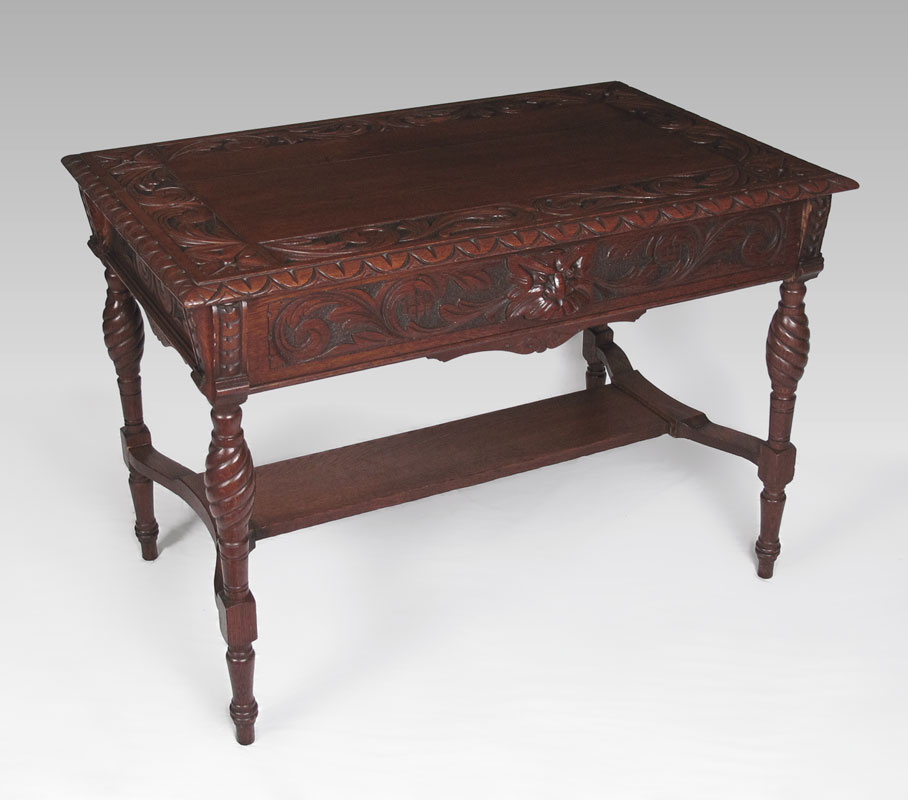 CARVED OAK LIBRARY TABLE: Lion