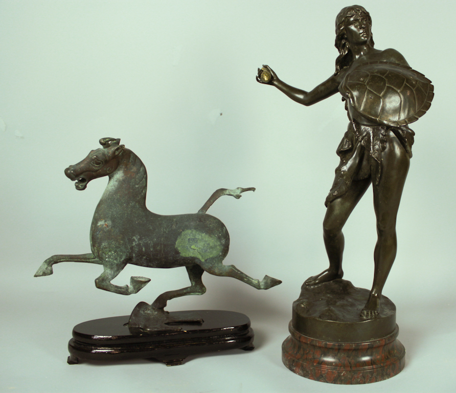 A BRONZE MODEL OF A GALLOPING HORSE 148153