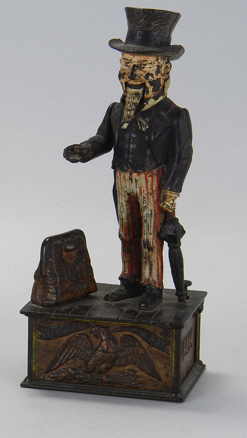 CAST IRON UNCLE SAM MECHANICAL BANKMade