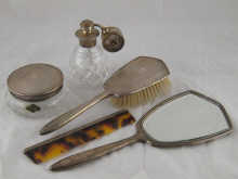A five piece silver mounted dressing