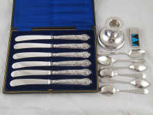 A boxed set of six silver handled tea