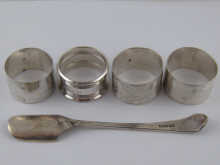 Silver. An Art Deco cheese scoop a pair