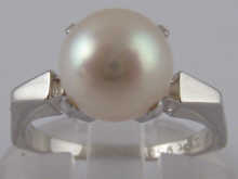 A platinum and Mikimoto cultured pearl