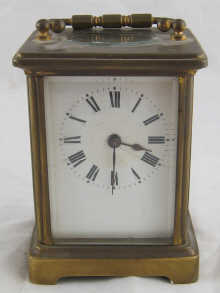 A brass cased carriage clock with 14ab92