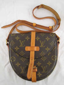 A satchel hand bag by Louis Vuitton