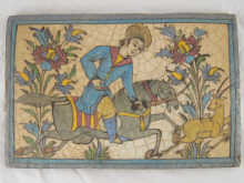 A Persian tile panel of a huntsman