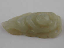 A jade carving of a reclining figure