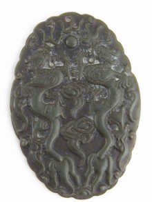 A Chinese black hardstone oval