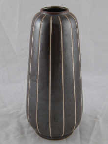 An art pottery vase incised marks and