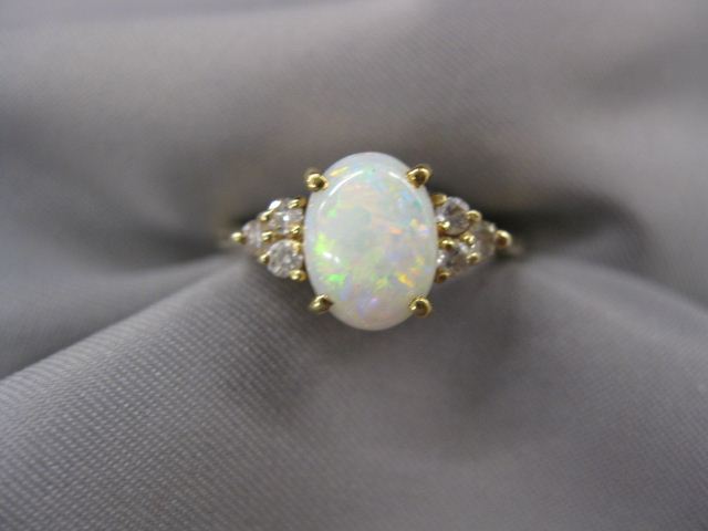 Opal & Diamond Ring fiery oval gem with