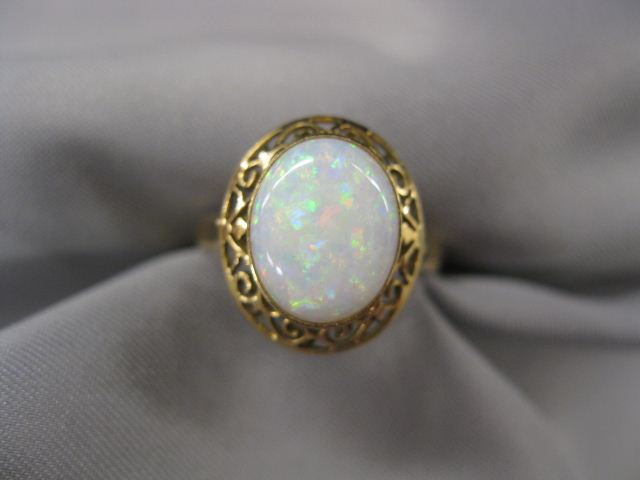 Opal Ring 3 carat fiery oval cabochon 14ac10