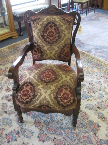 Carved Arm Chair floral brocade.
