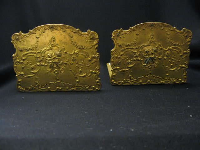 Pair of Bronze Bookends cherub & floral