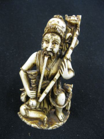 Carved Ivory Figurine man with pipe