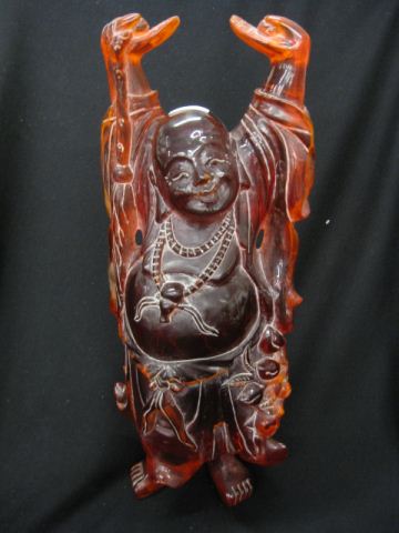 Cherry Amber Figurine of a Smiling 14b074