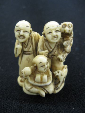 Carved Ivory Netsuke family group with