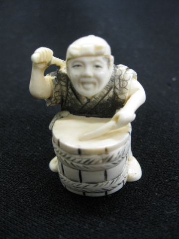 Carved Ivory Netsuke of Man Playing