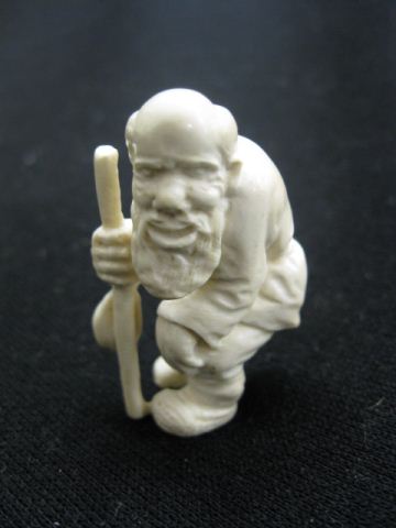 Carved Ivory Figurine of an Old 14b170