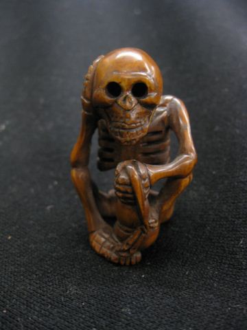 Carved Wooden Netsuke of a Skeleton 14b16e