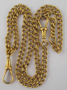 An 18 carat gold curb link Albert 14b281