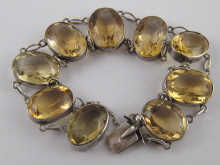 A white metal (tests silver) citrine