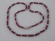 A necklace comprising ruby and 14b2d9