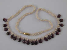 A garnet and seed pearl necklace