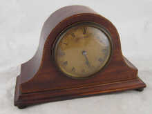 A mahogany mantel clock by J.W.