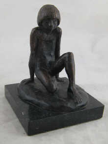 A bronze figure of a naked boy 14b2fc