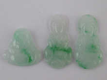 Three Chinese jade pendant carvings.