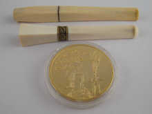 Two ivory Art Deco style cigarette holders