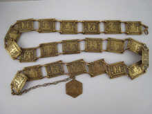 A Chinese brass belt decorated