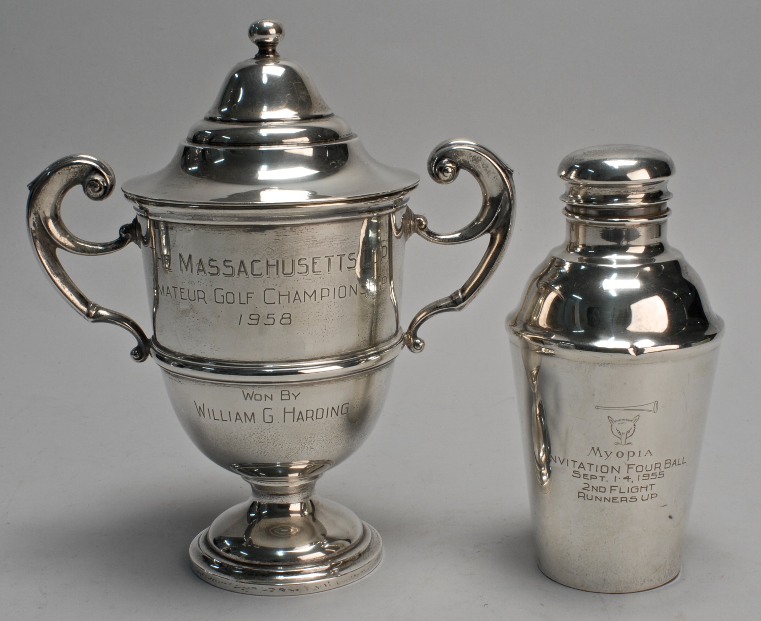 TWO STERLING SILVER TROPHIESOne in the