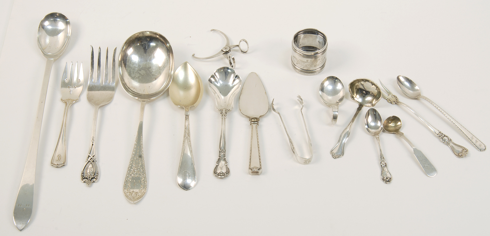 TWENTY PIECES OF STERLING SILVER FLATWAREBy