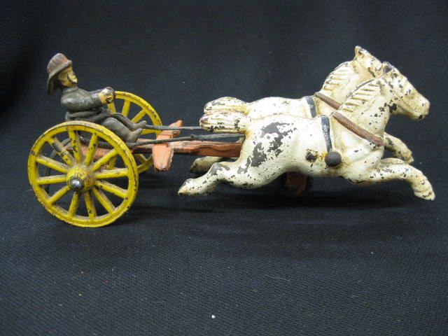 Antique Cast Iron Toy of Horses &driver