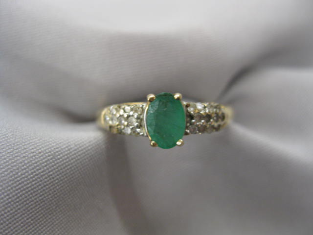 Emerald & Diamond Ring .35 carat oval