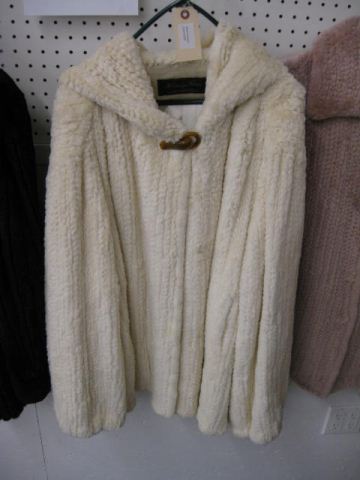 Fur Coat fine ivory color.